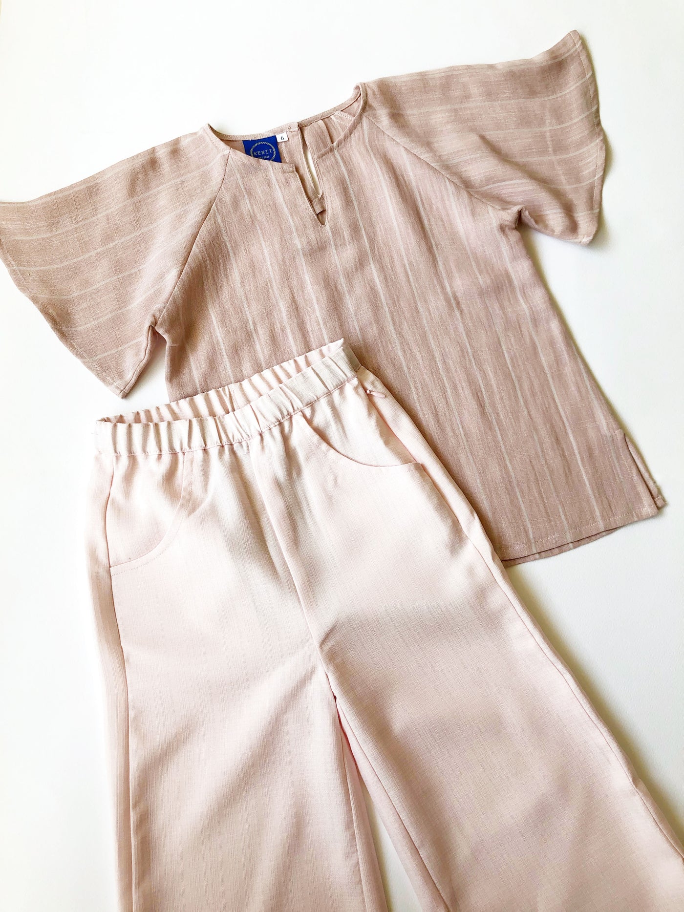 LOLA Wide-Leg Trousers in Off Pink