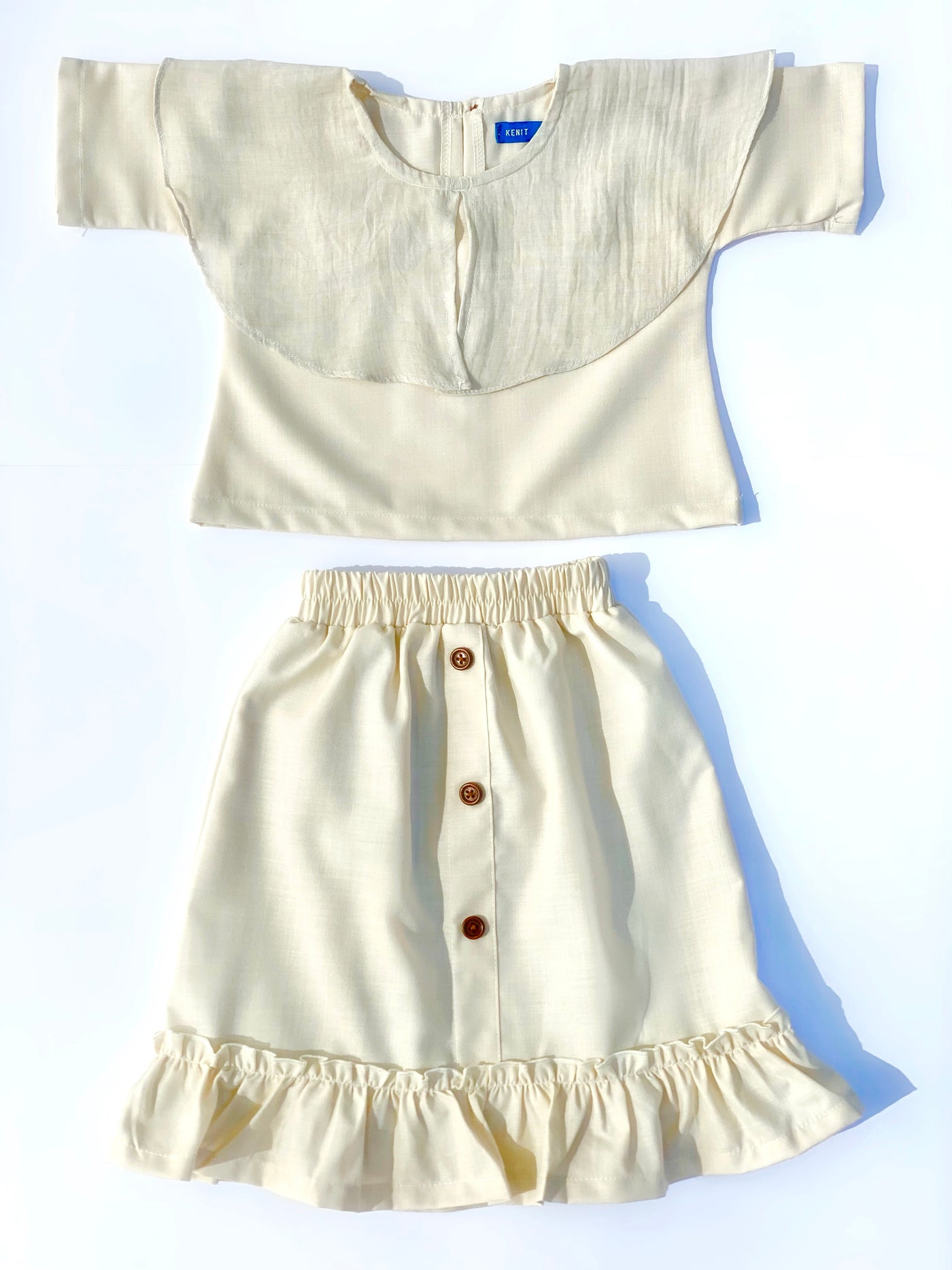 Mallory Buttoned Ruffle Skirt in Ivory